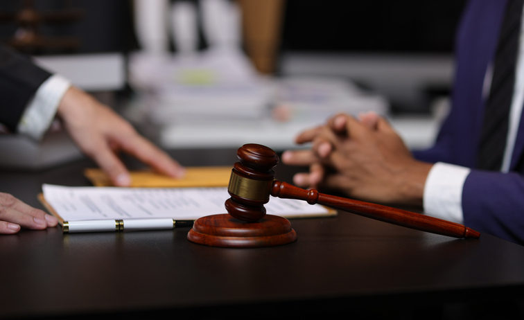 A gavel on a table

AI-generated content may be incorrect.